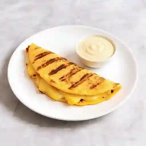 Arepa de choclo con queso y suero