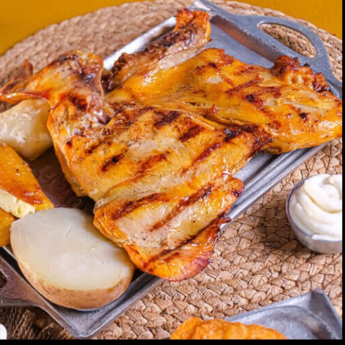Medio pollo al carbon