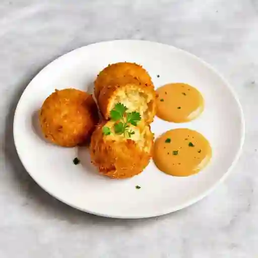 Croquetas De Yuca Con Salsa Huancaina