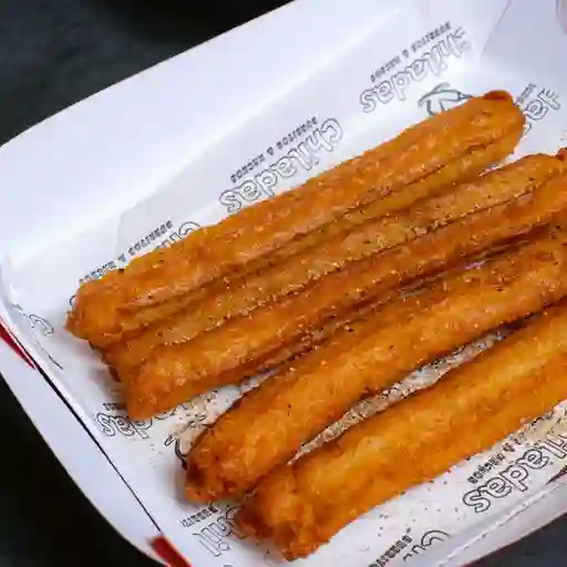Churros con salsa de frutos rojos