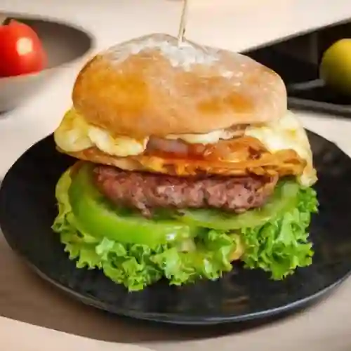 Dos Hamburguesas Artesanales + Papitas