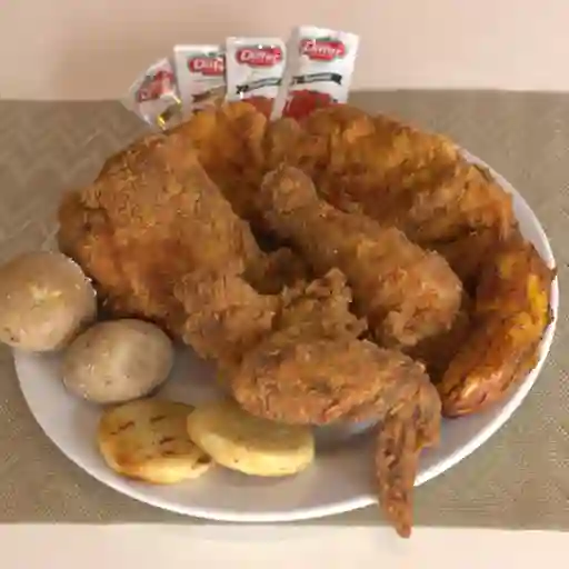 Medio pollo apanado