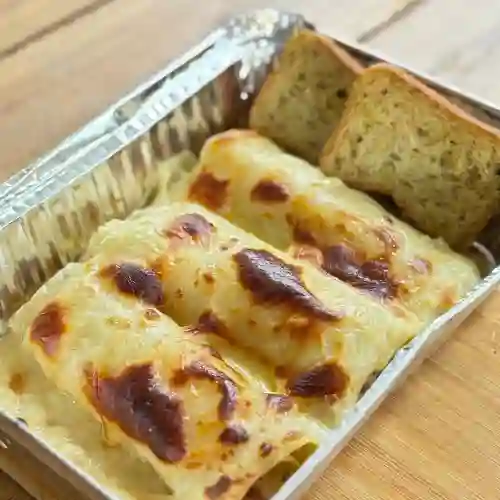 Canelones Pollo y Tocineta