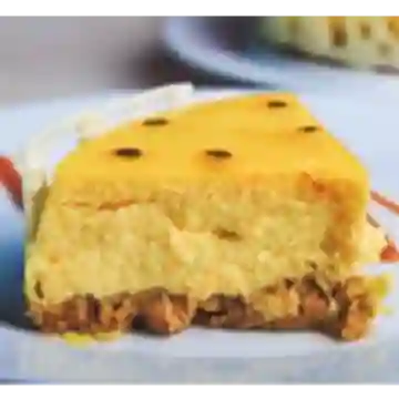 Porción de Cheesecake de Maracuyá