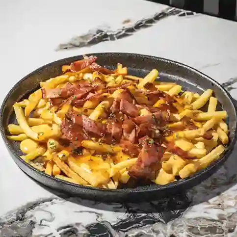 Papas con queso cheddar