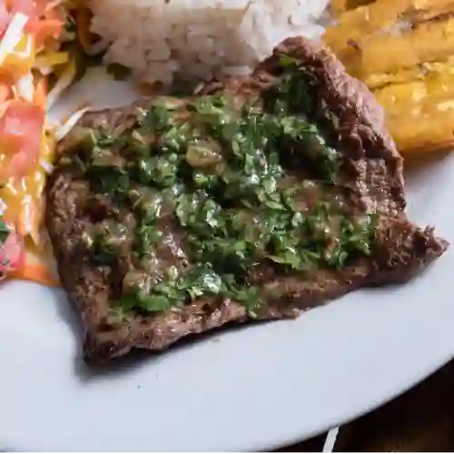 Res a la Plancha en Salsa Argentina.