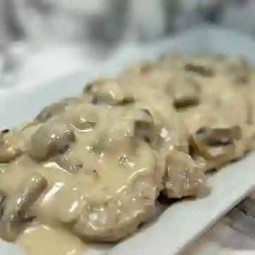 Filete de cerdo salsa champiñones