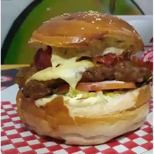 Hamburguesa Oasis más Pollo Tocineta