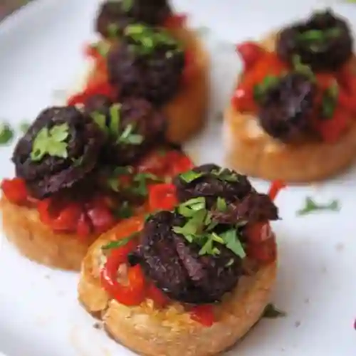 Morcilla con Alloli y Pimientos