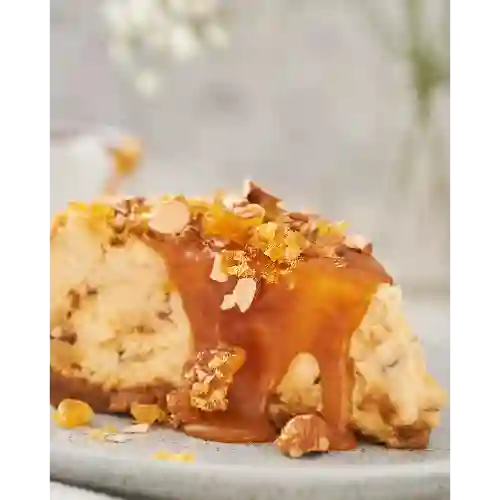 Cheescake de Caramelo y Praline (porción)