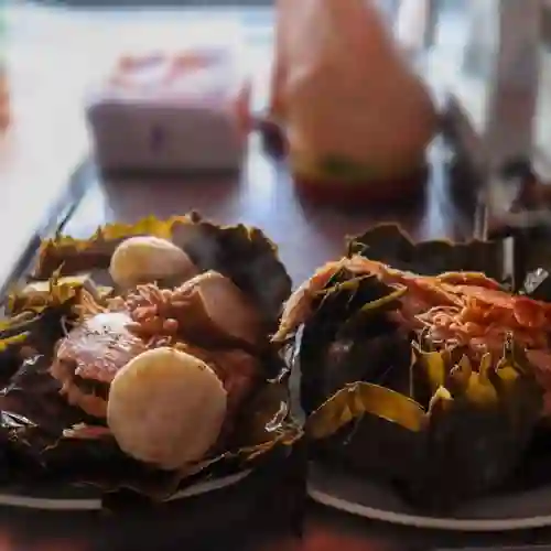 Tamal con Lechona Picante