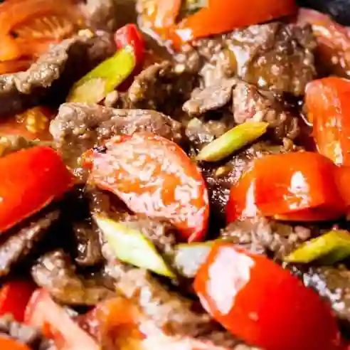 Carne con Tómate.