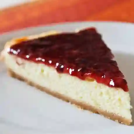 Porción Cheesecake Frutos Rojos