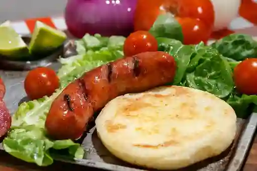 Chorizo con arepa