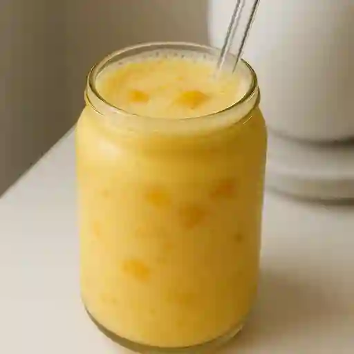 Jugo de mango en leche