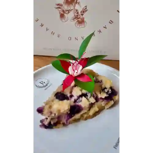 Porción Cheesecake de Arándanos