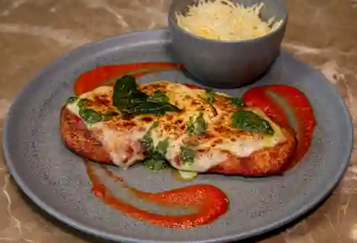 Milanesa a la parmigiana