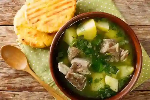 Desayuno con Caldo de Costilla