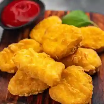 Nuggets de pollo 10 unidades + papas