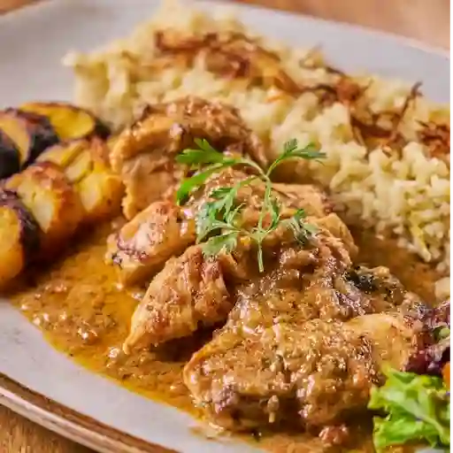 Pollo en zumo de coco