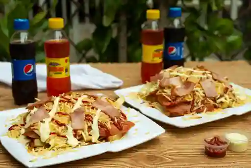 2x1 Combo Salchipapa de la Casa