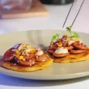 Arepas con Chorizo en Melao