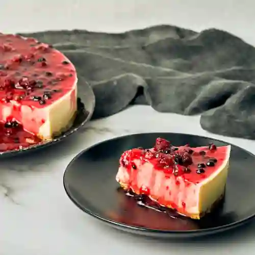 Porción Cheesecake Frutos Rojos