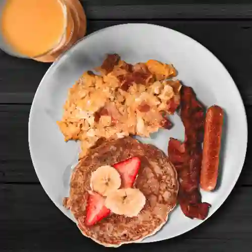 Huevos Al Gusto Bacon + Queso + Jugo