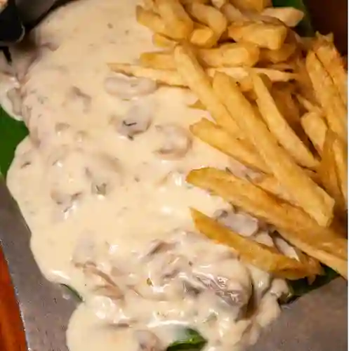 Cañón en Salsa de Champiñones