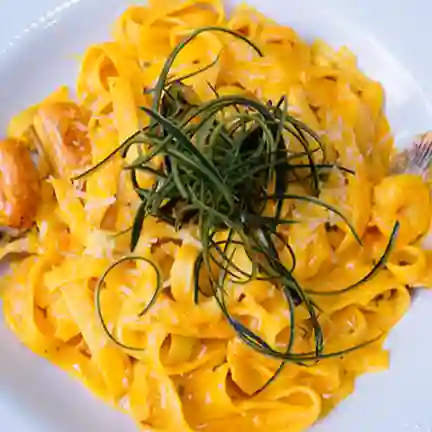 Fetuccini con Mariscos Kusi
