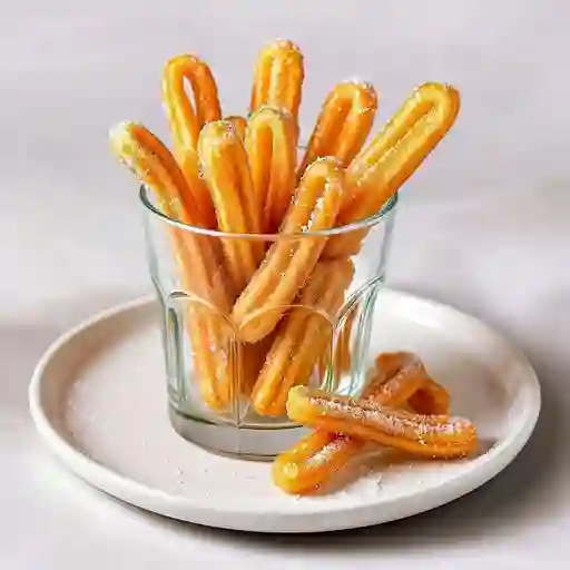 Vaso de mini churros azucarados