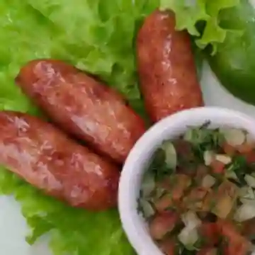 Chorizo con Arepa de la Casa