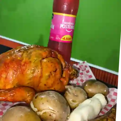Un pollo asado con gaseosa
