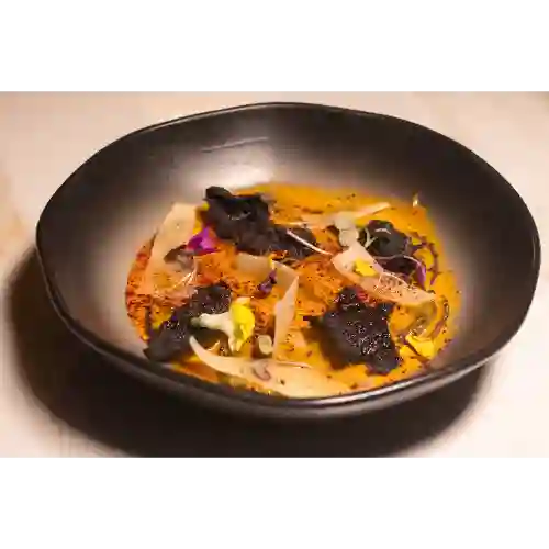 Raviolis de jaiba en salsa de rocoto ace