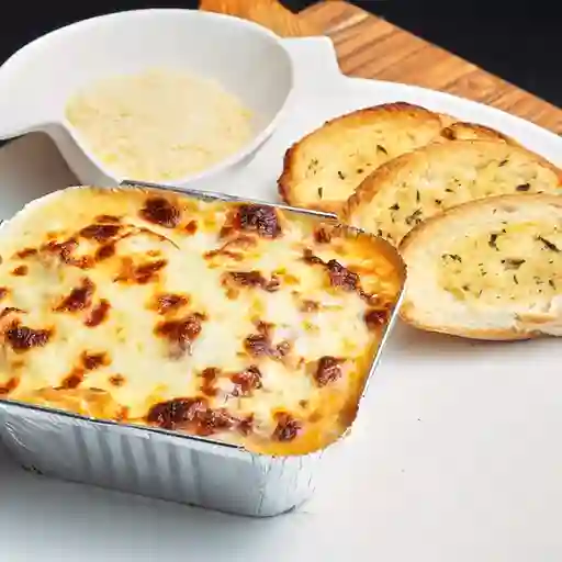 Lasagna vegetariana y bebida