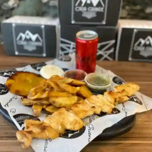 Chuzo de Cerdo + Papas + Coca-Cola