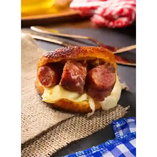 Arepa de choclo con chorizo