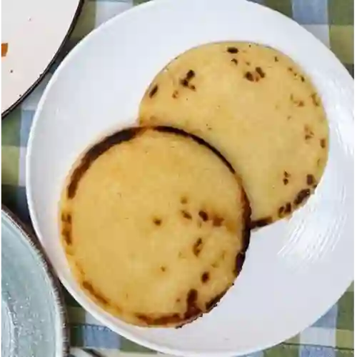 Porcion de Arepas de la Casa