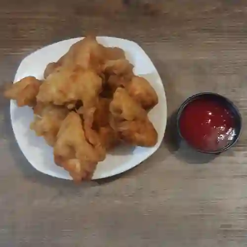 Porcion de Nuggets de Pollo 12 Unidades