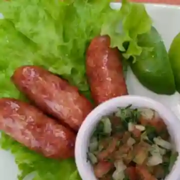 Chorizo con Arepa de la Casa