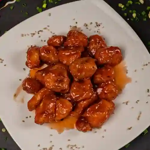 Cerdo Agridulce Con Ajonjolí