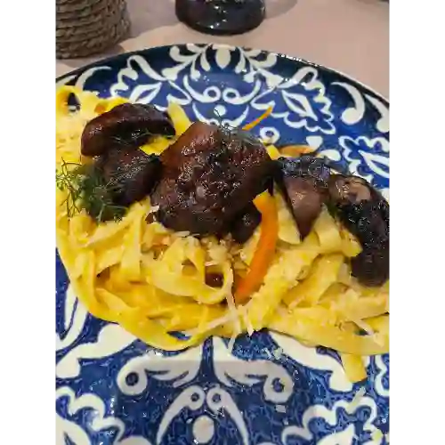 Fetuccini Huancaína con Portobellos