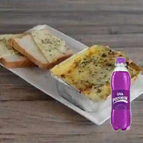 Combo Lasagna Pollo y Champiñón + Gaseosa Uva 250Ml.