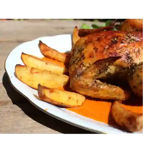 1/2 Pollo Al Horno y 2 Acompañantes