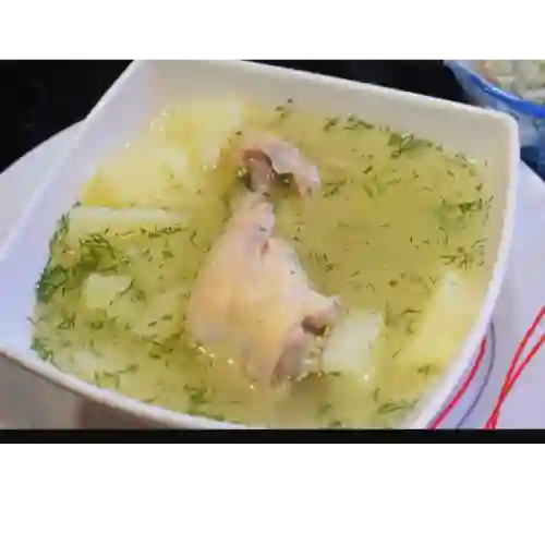 Caldo de Pierna Pernil (24onz) 2 Arepas