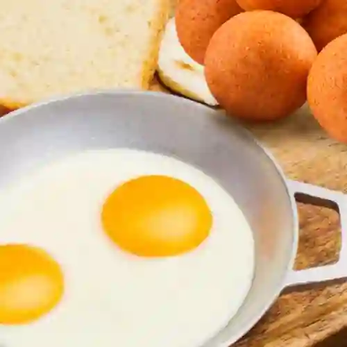 Huevos Al Gusto+buñuelo O Pandebono + Bebida Caliente