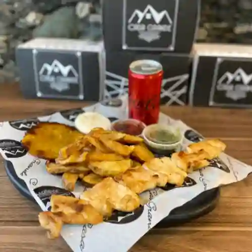 Chuzo de Pollo + Papas + Coca-Cola