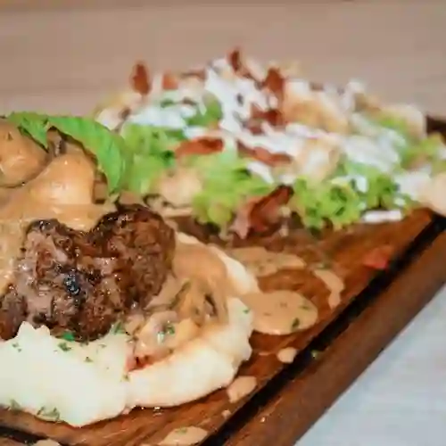 Lomo en Salsa de Champiñones