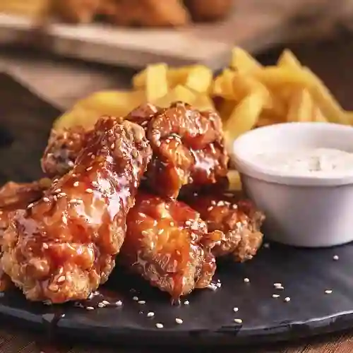Alitas Prime en Salsa X 12 + Papas