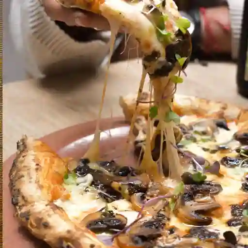 Pizza de setas trufadas
